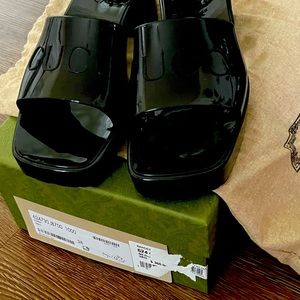 Gucci Slides. Barely worn. Slides come in original box with dust bags.